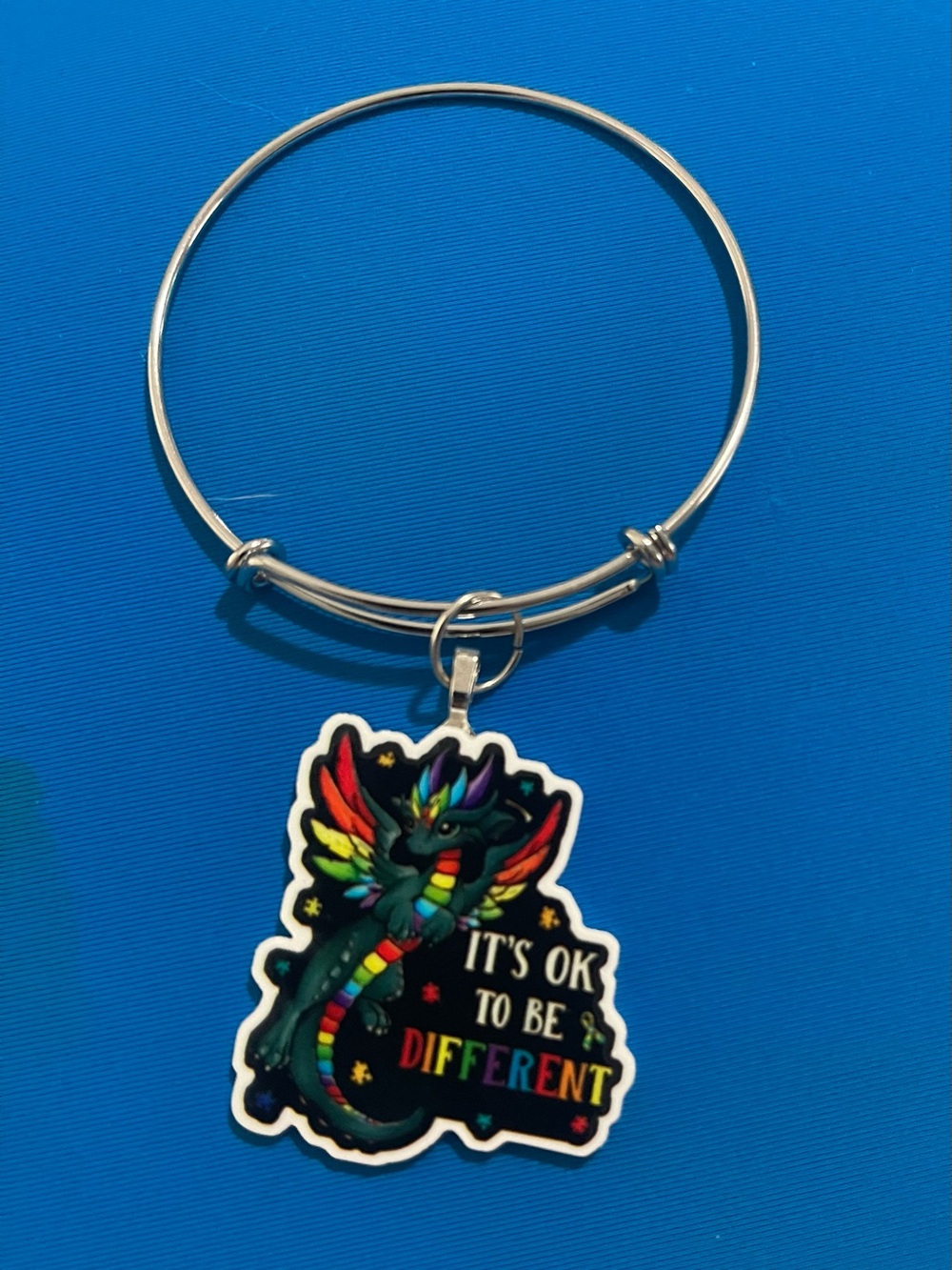 Silver Bangle Bracelet with Rainbow Dragon Charm - "It's OK to Be Different"